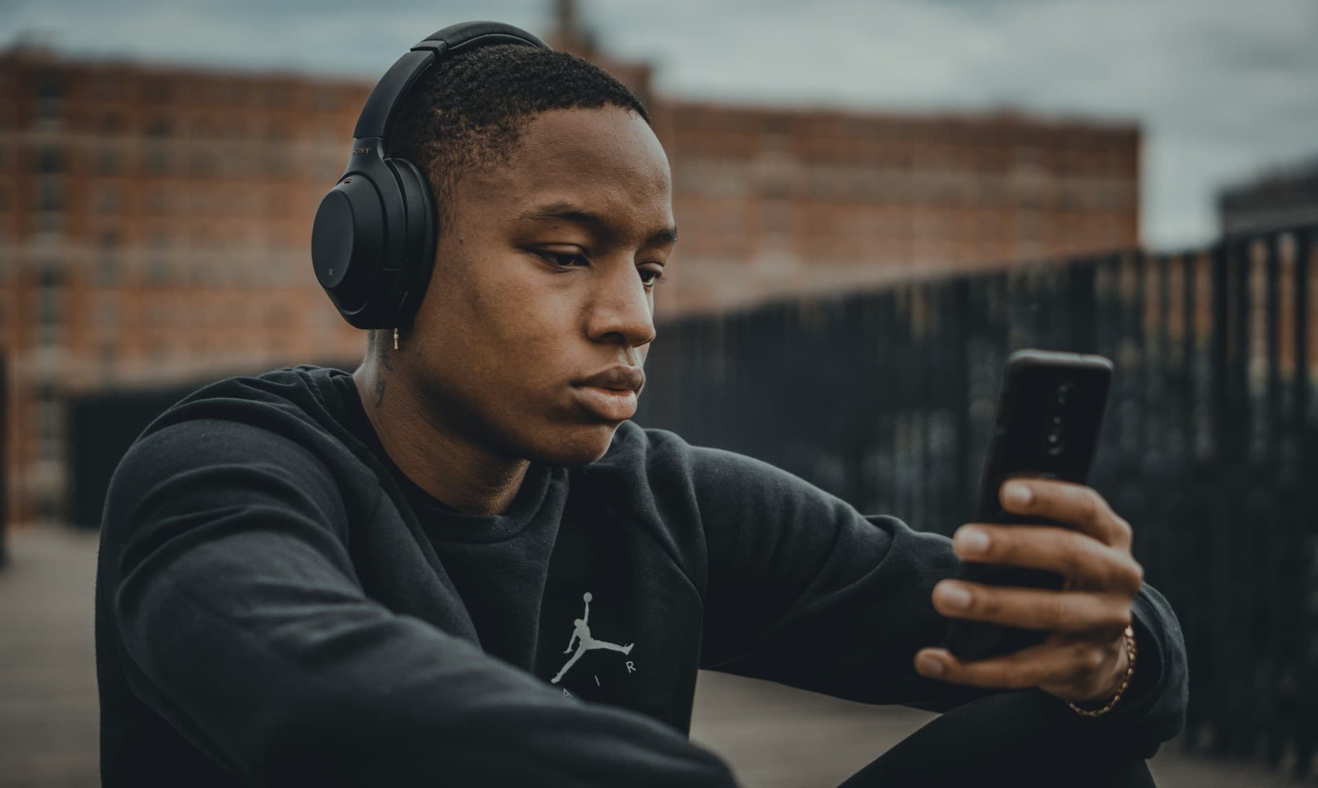 Hero image of a man wearing headphones